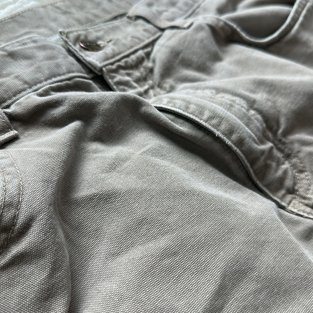 Carhartt distressed carpenter pants with some stains and holes. #10015 - Picture 5 of 11